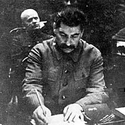 Stalin signing a death warrant in 1936