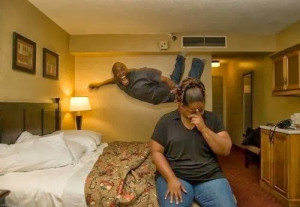 Funny Married Couple Hotel Picture - Husband sky diving photo bomb ...
