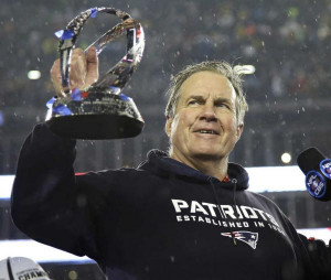 New England Patriots head coach Bill Belichick holds the championship ...