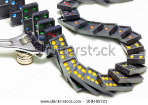 Stop the domino effect concept for solution to a problem - stock photo