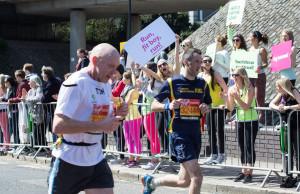 The lululemon girls positioned themselves at mile 17, a notoriously ...