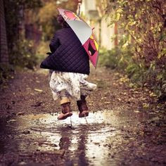... dress - young girl splashes through puddles with umbrella - 12x12 More