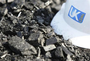 hard hat lies on top of a coal seam at a UK Coal mine in northern ...
