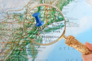 776508-magnifying-glass-over-new-york-new-york-map-with-destination ...
