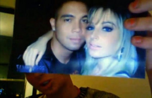 Tulisa Contostavlos holds up a picture of her and ex-boyfriend Justin ...