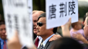 Blind Chinese activist Chen Guangcheng together with relatives of