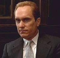 Robert Duvall portraying Tom Hagen