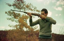 hunter with shot gun