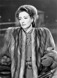 Joan Crawford , I believe in the dollar. Everything I earn, I ...