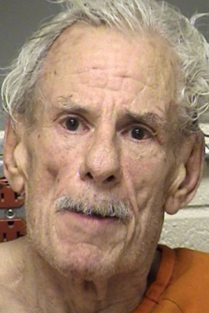 Michael Stolz man shoots dog wife poop floor