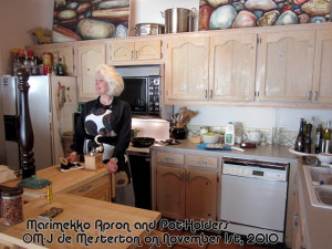 de Mesterton with Marimekko apron and pot-holders, from the ...