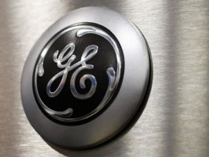 General Electric logo is seen on a microwave oven. (Photo: Paul Sakuma ...