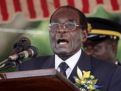 Mugabe warns against giving land back to whites
