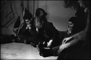 Greenwich Village poetry reading, 1959. Allen Ginsberg is sitting on ...