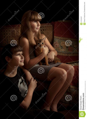 Girl And Boy With Cat Indoors Low...