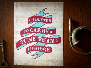 it s better to carry a tune than a grudge print earmark social