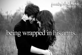 Being wrapped in his arms