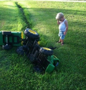 ... TINY JOHN DEERE TRACTOR WITH WAGON TIPS INTO DITCH - LITTLE BOY SAD