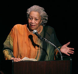 Photograph of Toni Morrison, showing her in an orange and green dress ...