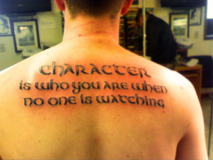 Meaningfull Quote Tattoo On Upperback