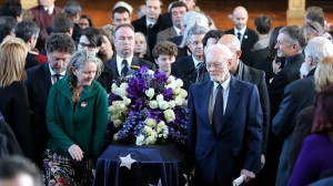 Joan Kirner s husband Ronald and daughter Kate with her casket at