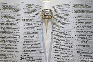 Close up of Psalm 23 Bible verse with ring that cast a shadow of a ...