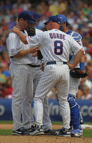 Mike Quade Manager Mike Quade 8 of the Chicago Cubs talks with