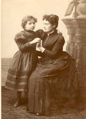 ... talk with her teacher, Anne Sullivan. The picture was taken in 1890