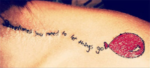 Christina tattooed a red balloon on her shoulder with the words ...