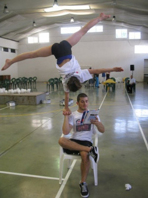 gymnastics Reading handstand just casually one arm acrobatic ...