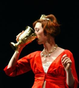 Queen Gertrude drinks from the wine that Claudius poisoned