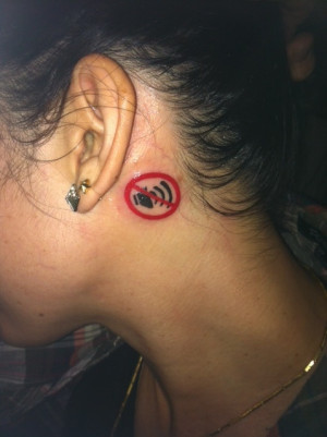 ... here. This young lady has bilateral hearing impairment. Great tattoo