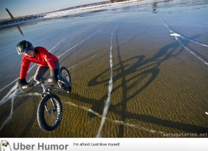 Winter cycling on crystal clear Lake Michigan ice