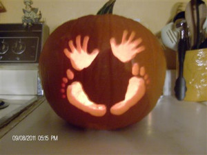 Baby's first pumpkin carving idea!