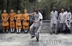 ... pupils look on at the famous Shaolin Temple in Henan Province (CFP