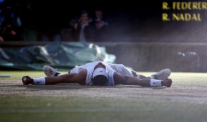 Flat out after five hours ... Rafael Nadal celebrates after defeating ...