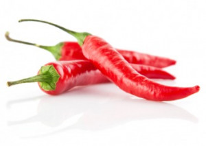 Three red chile, or chili, peppers.