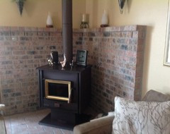 Please help! I would so love to redo this UGLY fireplace made of brick