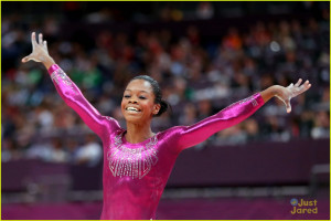 About This Photo Set: Gabrielle Douglas shows off her shiny gold medal ...