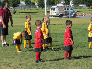 The blonde kid in red shirt in the middle is mine :)