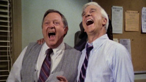 Leslie Nielsen as Sergeant Frank Drebin and Alan North as Captain Ed ...