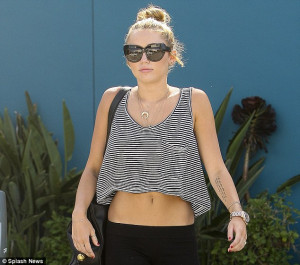 new inking miley cyrus debuted her new tattoo on her left forearm ...