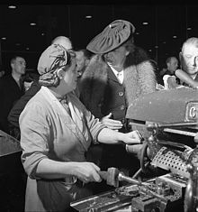 woman machinist talking with Eleanor Roosevelt during her goodwill ...