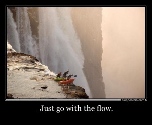 Kayaking on the river with waterfalls.