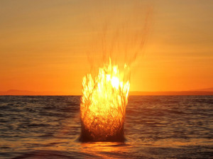 Picture of the splash from a rock being thrown into the water in ...