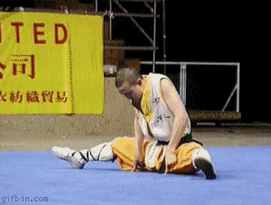 Shaolin Monk balances on two fingers Funny Animated .gif Image