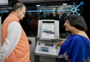 Union Finance Minister Arun Jaitley and SBI Chairperson Arundhati ...