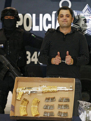mexico ak47 Weapon drug war cartel gold gun Ramiro Pozos Gonzalez