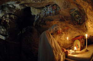 Fr. Lazarus el Anthony prays the Liturgy in the cave of St. Anthony ...