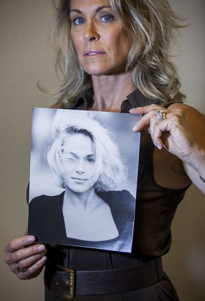 Accuser, Barbara Bowman holds picture of herself as aspiring 17 yr ...